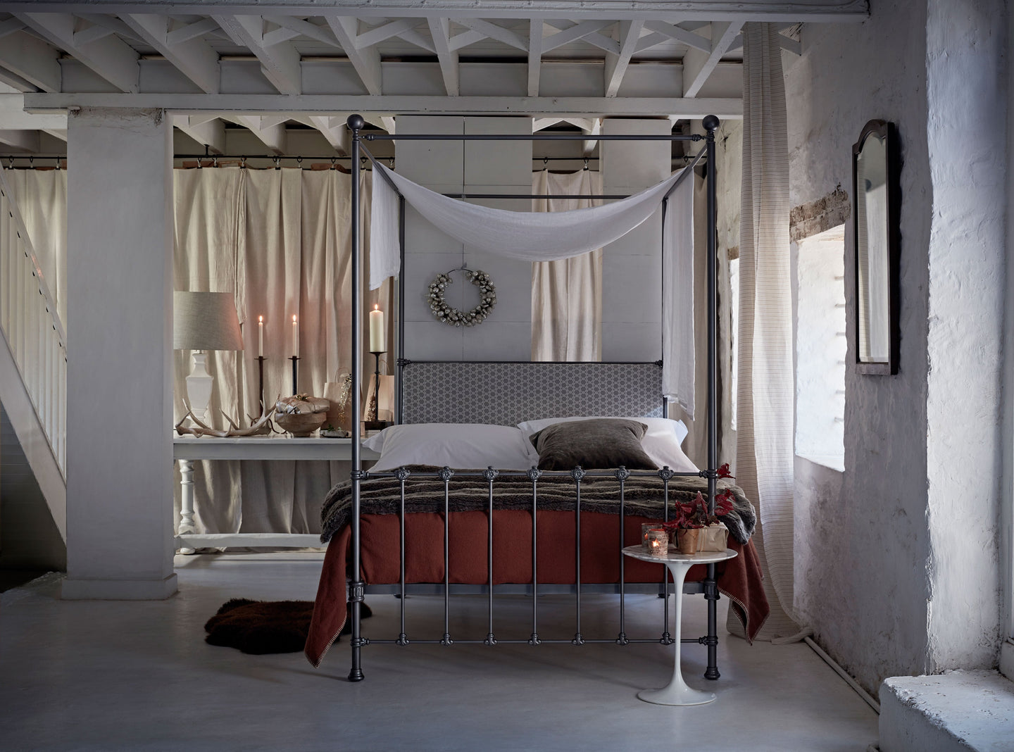 Five ways to dress a metal four-poster bed